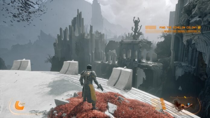 Player in a heavy suit stands on a snowy ledge, gazing at a ruined, spire-filled city; on-screen objective reads 'Find the Echelon Colony'.