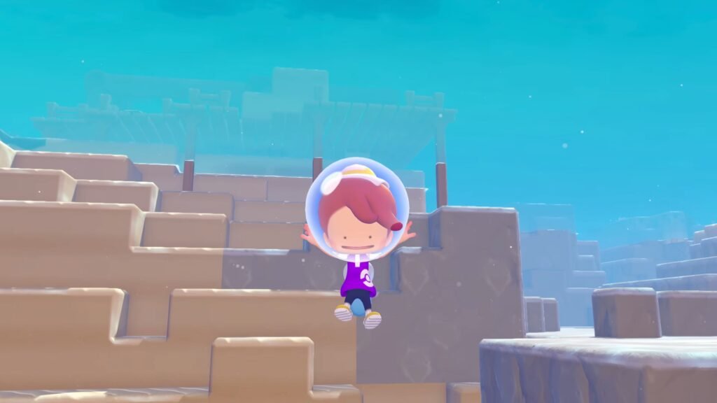 Cartoon child in a space helmet clinging to a brick ledge among stacked brown blocks with a bright blue sky behind. Pokémon Pokopia Expansion Pass Nintendo Direct 692026 0-26 screenshot
