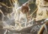 Stellar Blade: Blood Rain מציג גיבורה חדשה שלוקחת את העניינים לידיים Person in white armor surrounded by bright yellow electrical arcs, amid flying debris in an intense action moment
