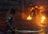 God of War: Laufey – עוד ספינאוף לאוסף Warrior kneels in a lava-lit cavern, facing a flaming demon amid sparks and rubble.