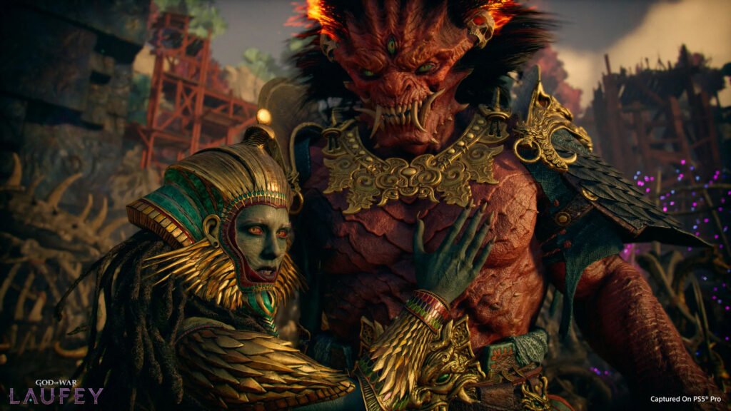 god of war laufey 3 - GamersPack ישראל Red-scaled demon in ornate gold armor embraces a green-skinned woman in elaborate headdress amid ruined ruins and neon lights in the background. god of war laufey 3