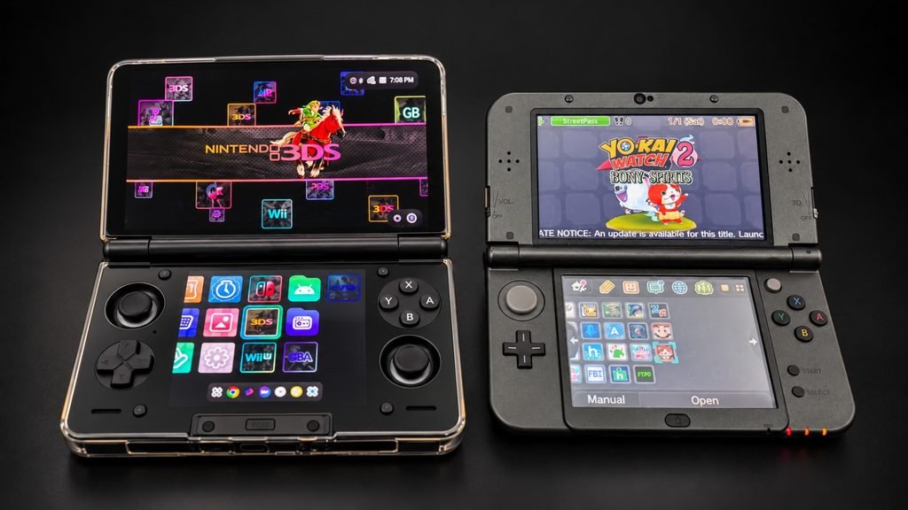 WhatsApp Image 2026-10-27 at 192058 1 - GamersPack ישראל Two Nintendo 3DS handhelds open and side-by-side, showing game menus on both screens in a dark studio setting. WhatsApp Image 2026-10-27 at 192058 1